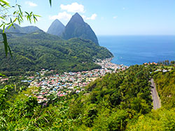 A winding coastal road overlooking Soufrière and the Pitons in Saint Lucia